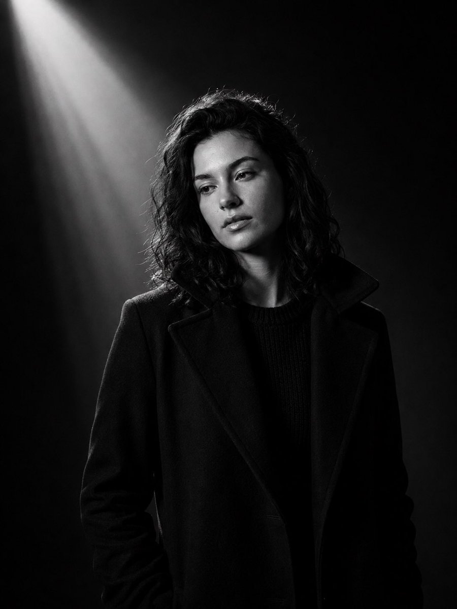 Black-and-White Studio Portrait with Diagonal Light Beam — AI result, variation 2 of 2