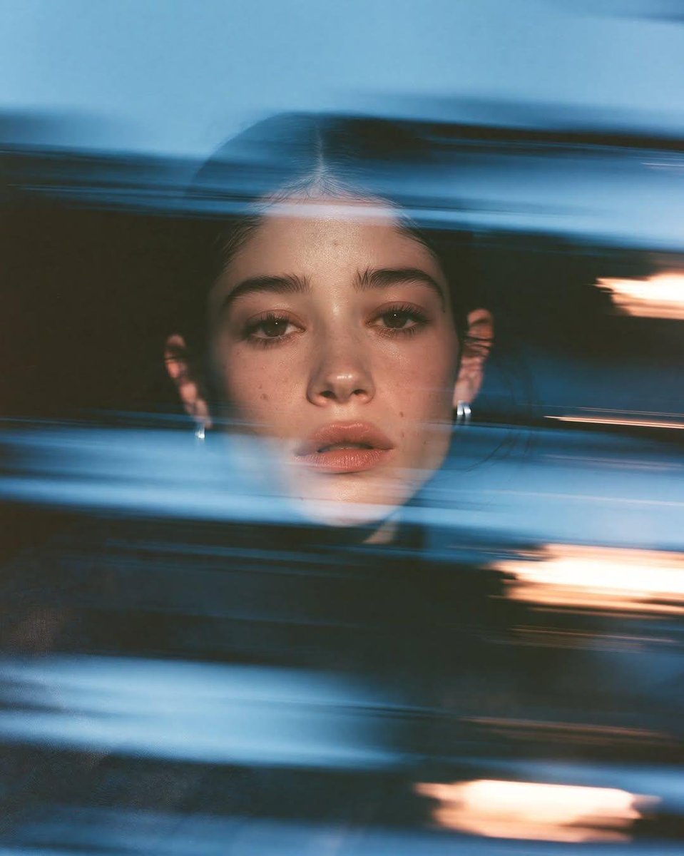 Close-Up Portrait With Blue Glass Light Streaks — AI result, variation 2 of 4