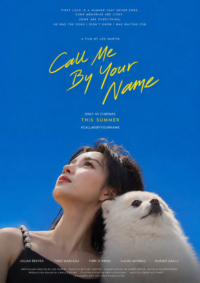 A bright cobalt field fills most of the frame while two figures lean together at the bottom edge, chins raised toward the empty sky. Handwritten yellow title…