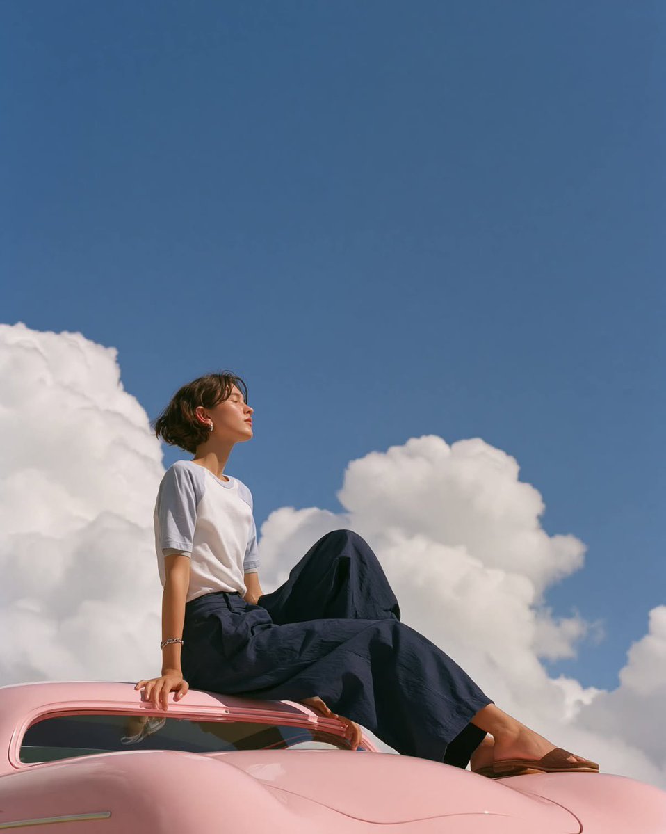 Woman on Pink Vintage Porsche Editorial Portrait — AI result, variation 2 of 4