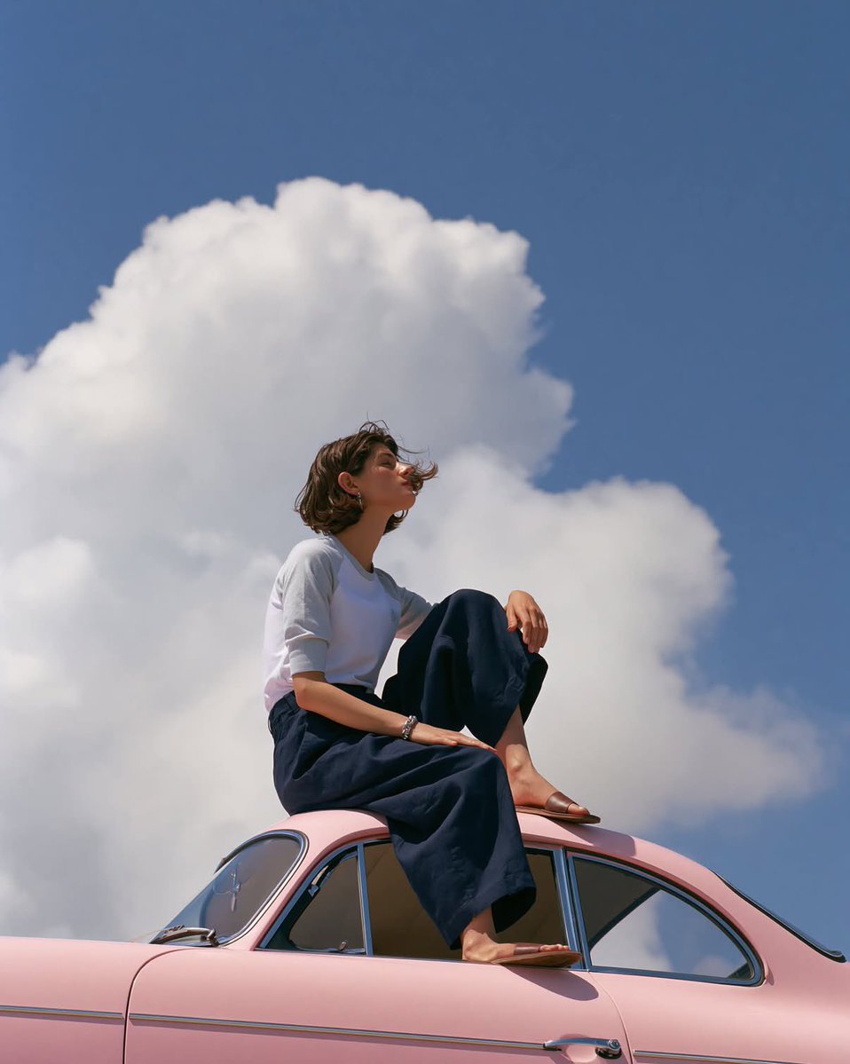 Woman on Pink Vintage Porsche Editorial Portrait — AI result, variation 4 of 4